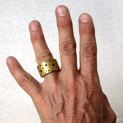 wide band brass Swiss Cheese ring