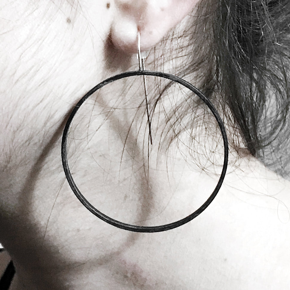 Big Circle Slice Earrings in black brass