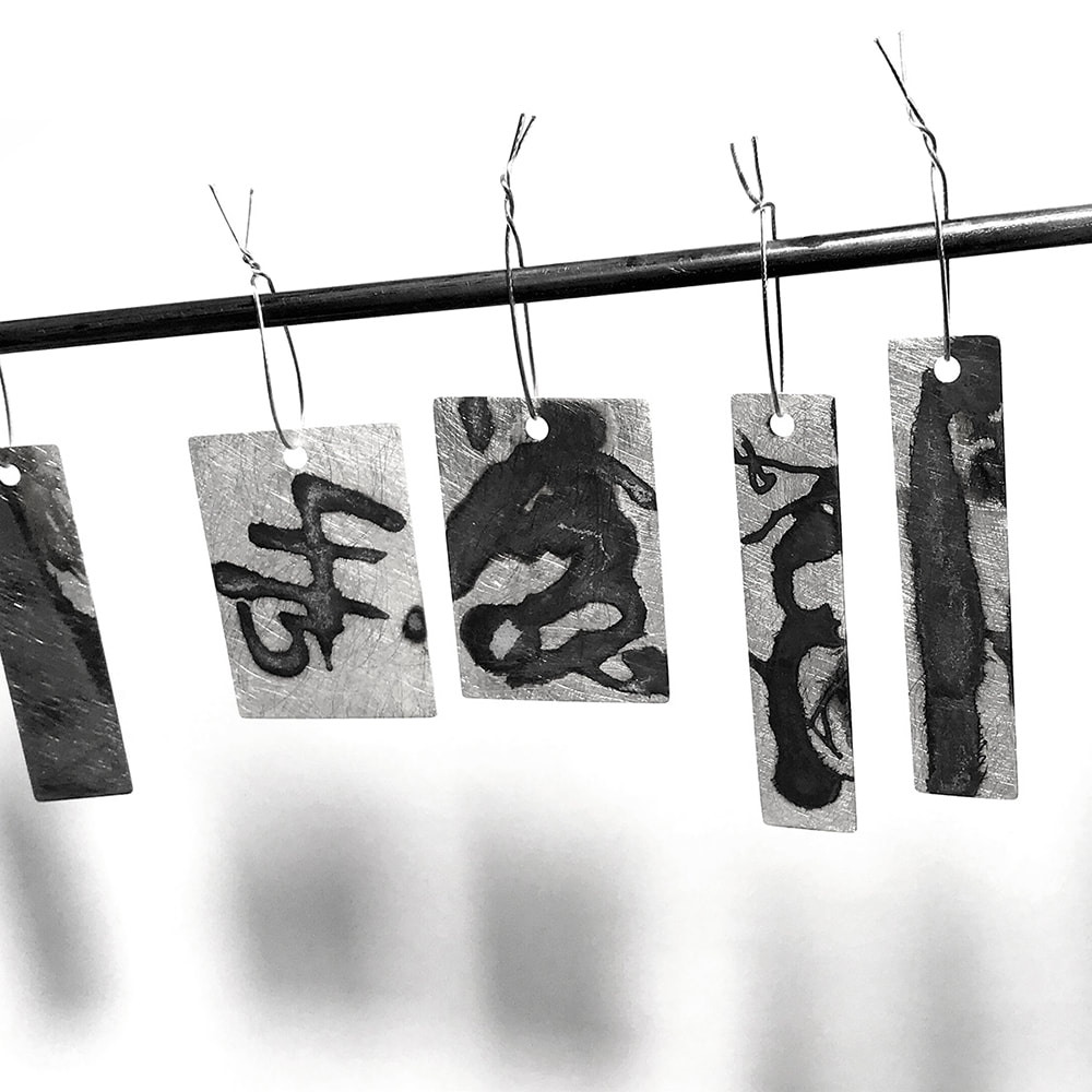 Black and White jewelry work in progress - all sealed and hung to dry