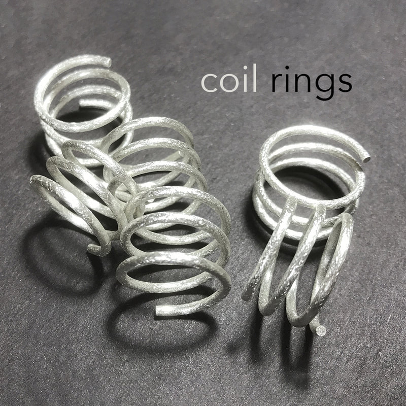 coil-rings-brushed-silver