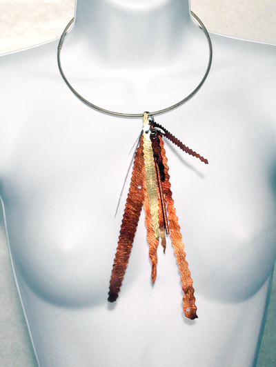 Copper Fall Necklace on white mannequin