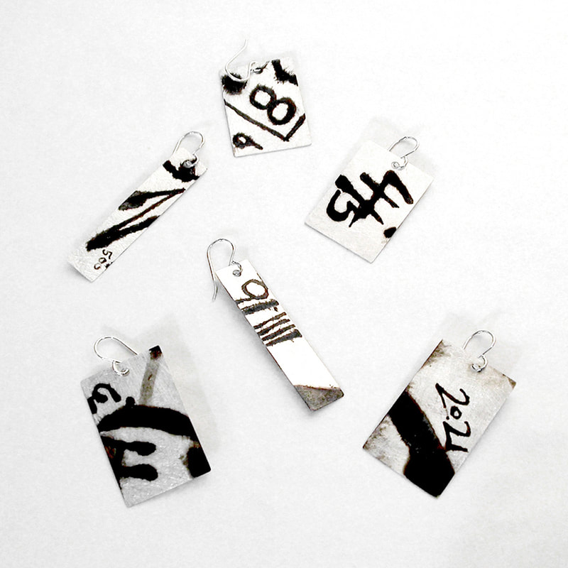 Black and White earrings collection in sterling silver and black stained patina