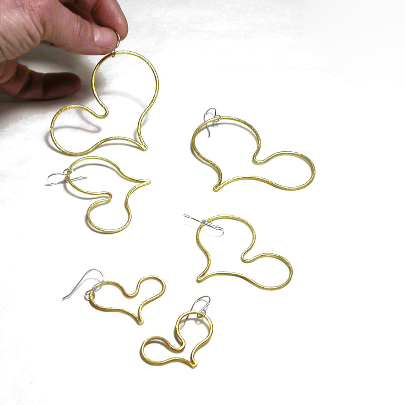 Hearts Earrings in lemon yellow brass in 3 sizes by Emanuela Aureli
