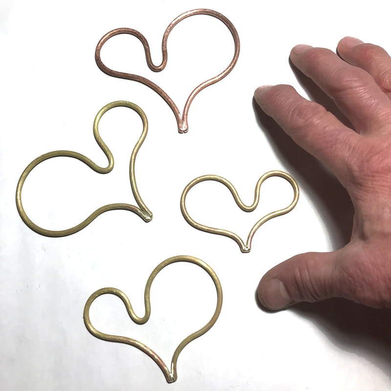 Hearts shapes in copper and brass in progress