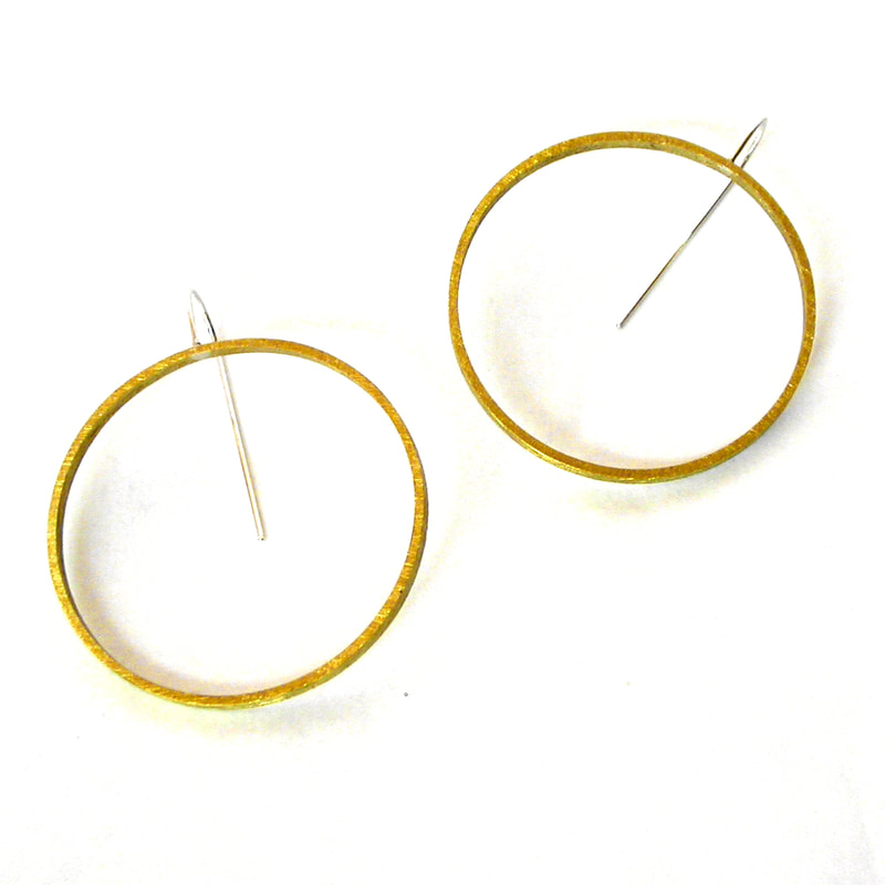 Big Circle Slice Earrings in yellow brass 
