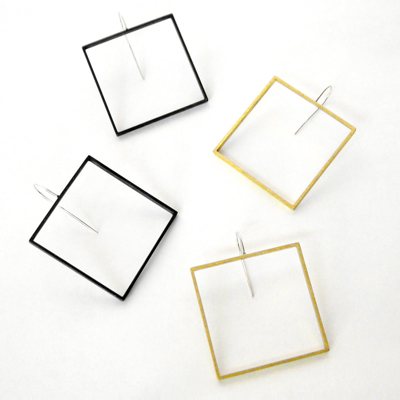 the square slice earrings - black and yellow brass