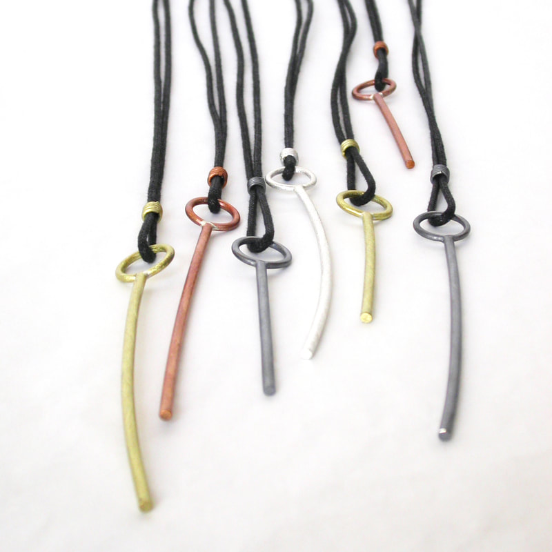 Stick pendants in colorful finishes and two sizes