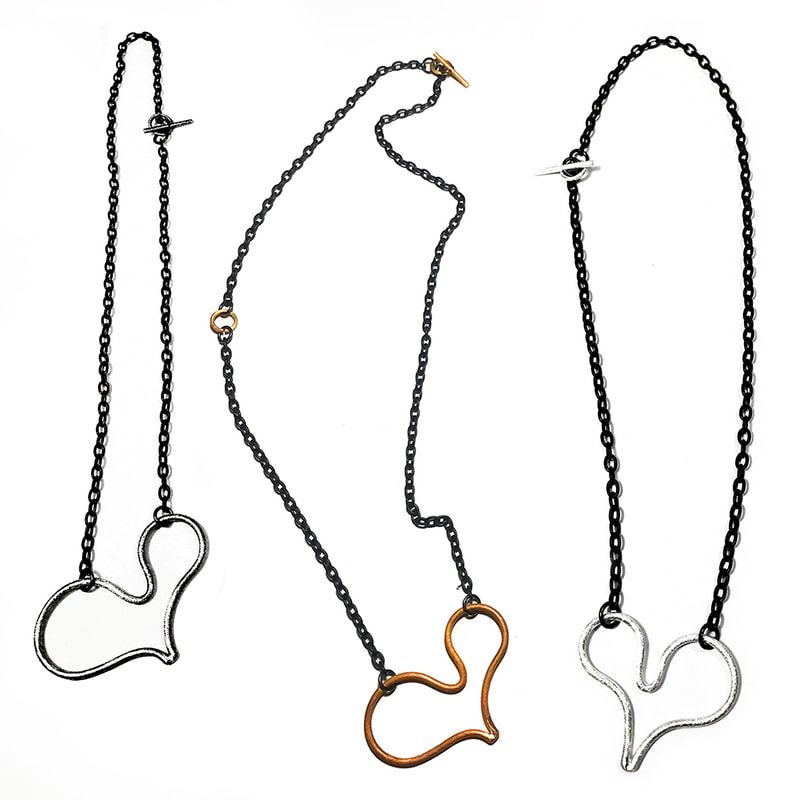 Sweet Heart Pendants in various lengths and finishes by Emanuela Aureli