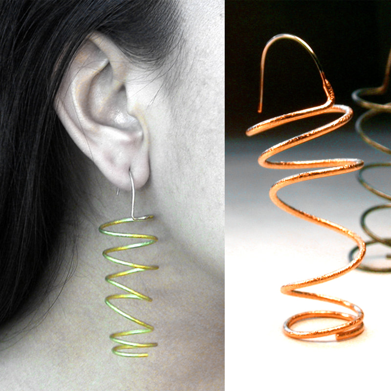 the dangling coil earrings